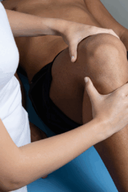 Reform Physical Therapy blog banner showing a patient working with a physical therapist in a clinic setting in Maine