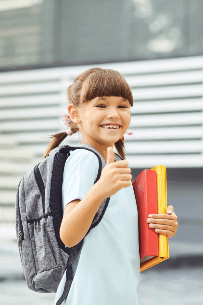Student wearing a backpack with both straps for safe posture