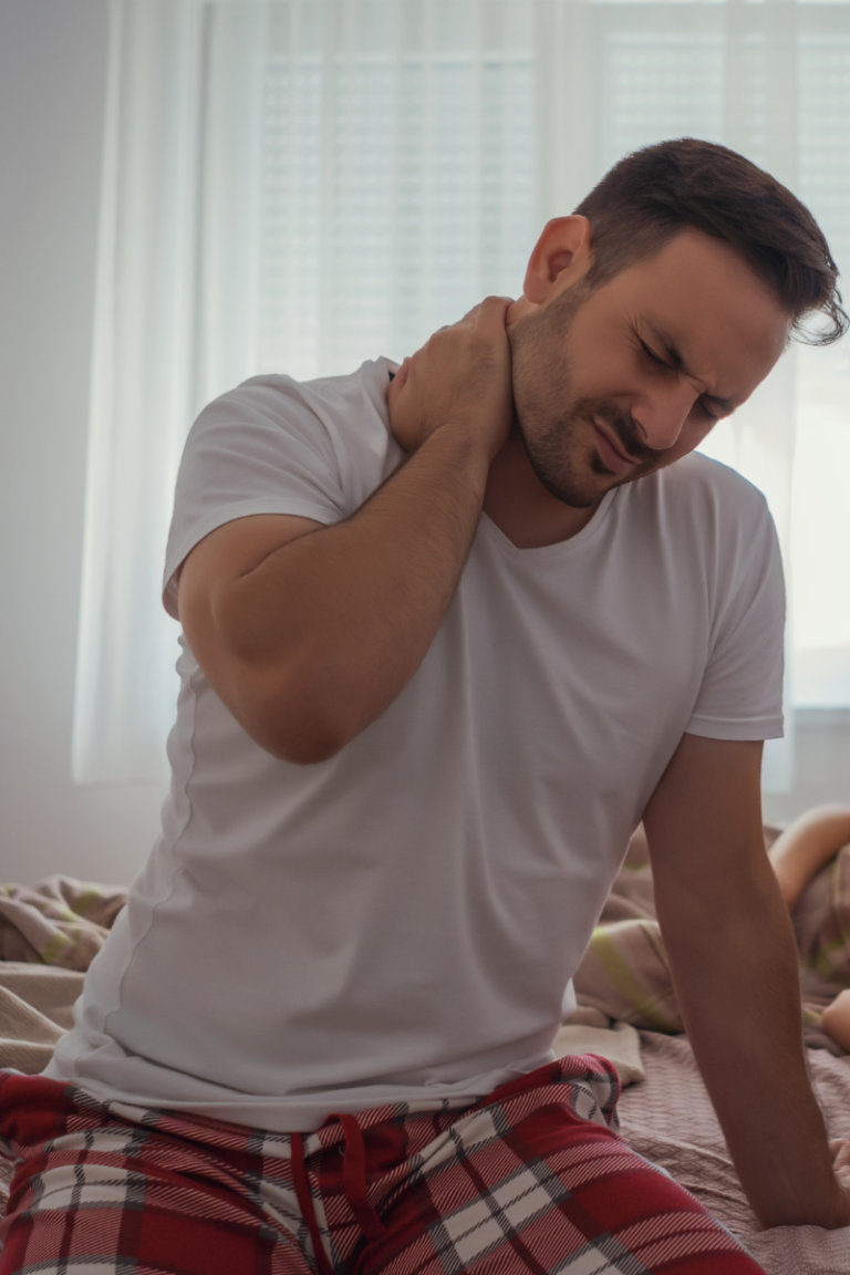 Patient experiencing lower back pain after waking up