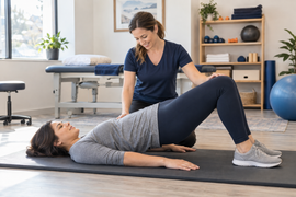 Woman beginning gentle exercise after C-section with guidance from a pelvic health physical therapist.